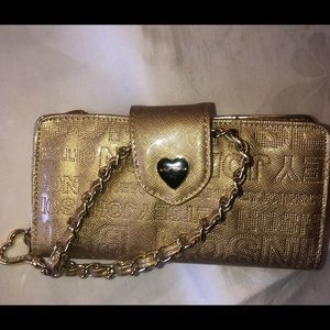 SOLD…. Betty Johnson wristlet/wallet clutch gold